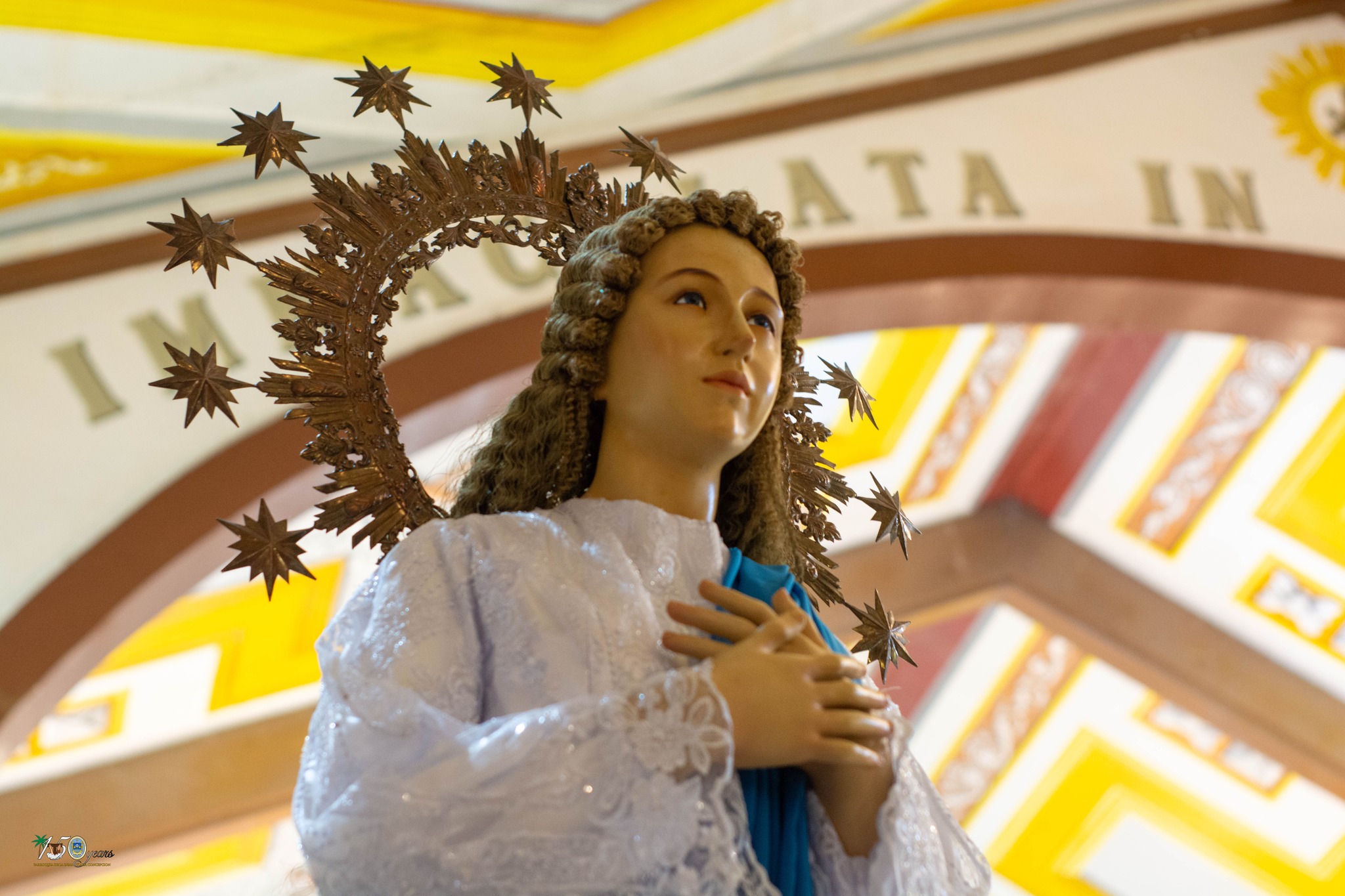 Immaculate Conception — stained glass or statue